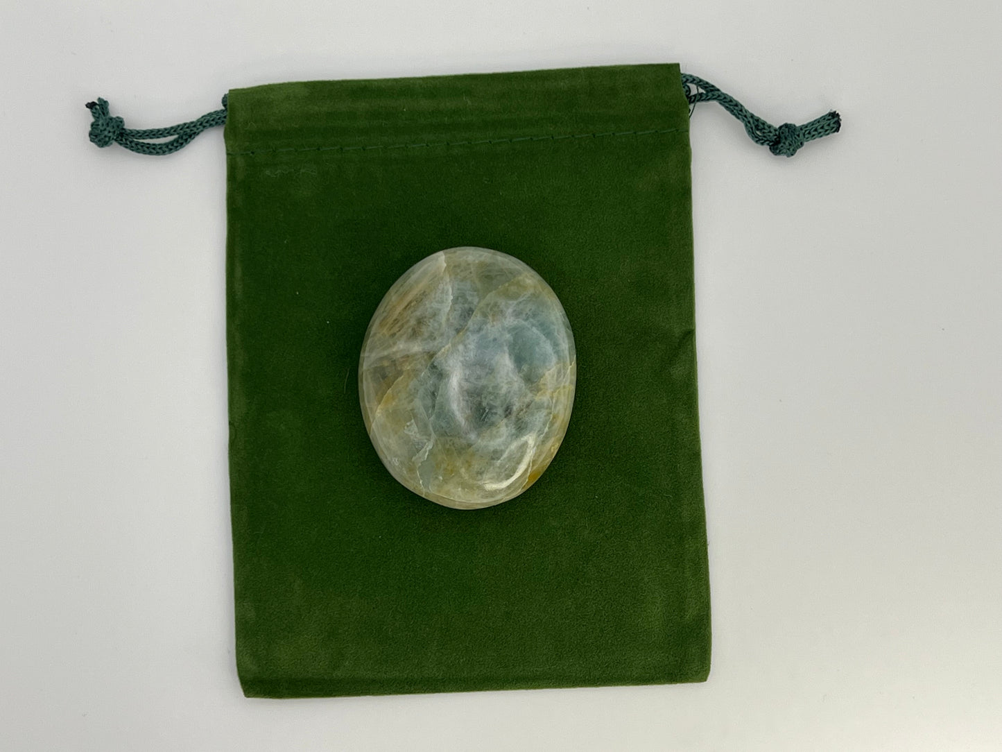 
                  
                    Aquamarine Palm Stone
                  
                