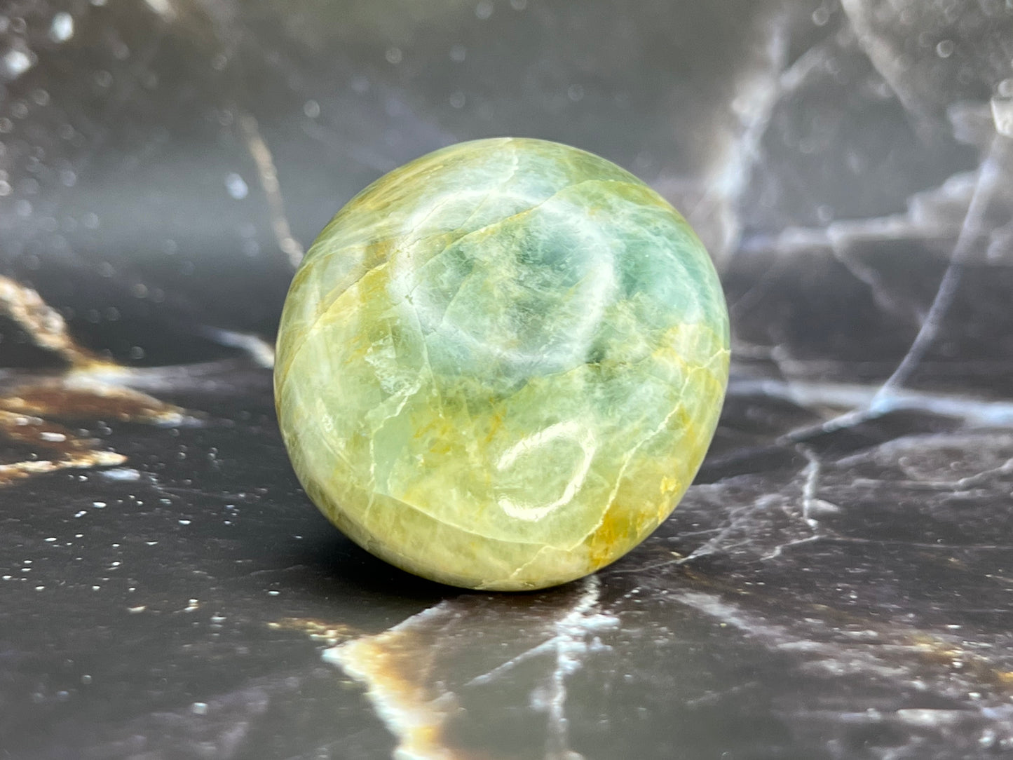 
                  
                    Aquamarine Palm Stone
                  
                